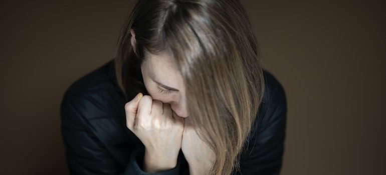 Woman being sad because of her benzodiazepine addiction