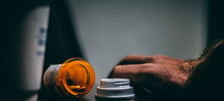 Open bottle of prescription pills, one of the most commonly abused drugs among millennials.