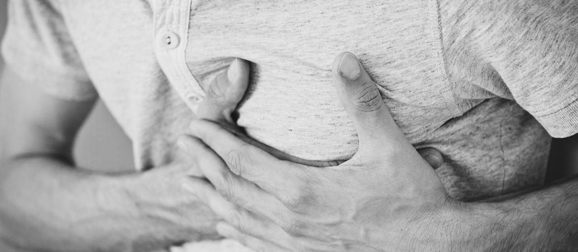 Man experiencing a heart attack because of mixing stimulants and depressants.