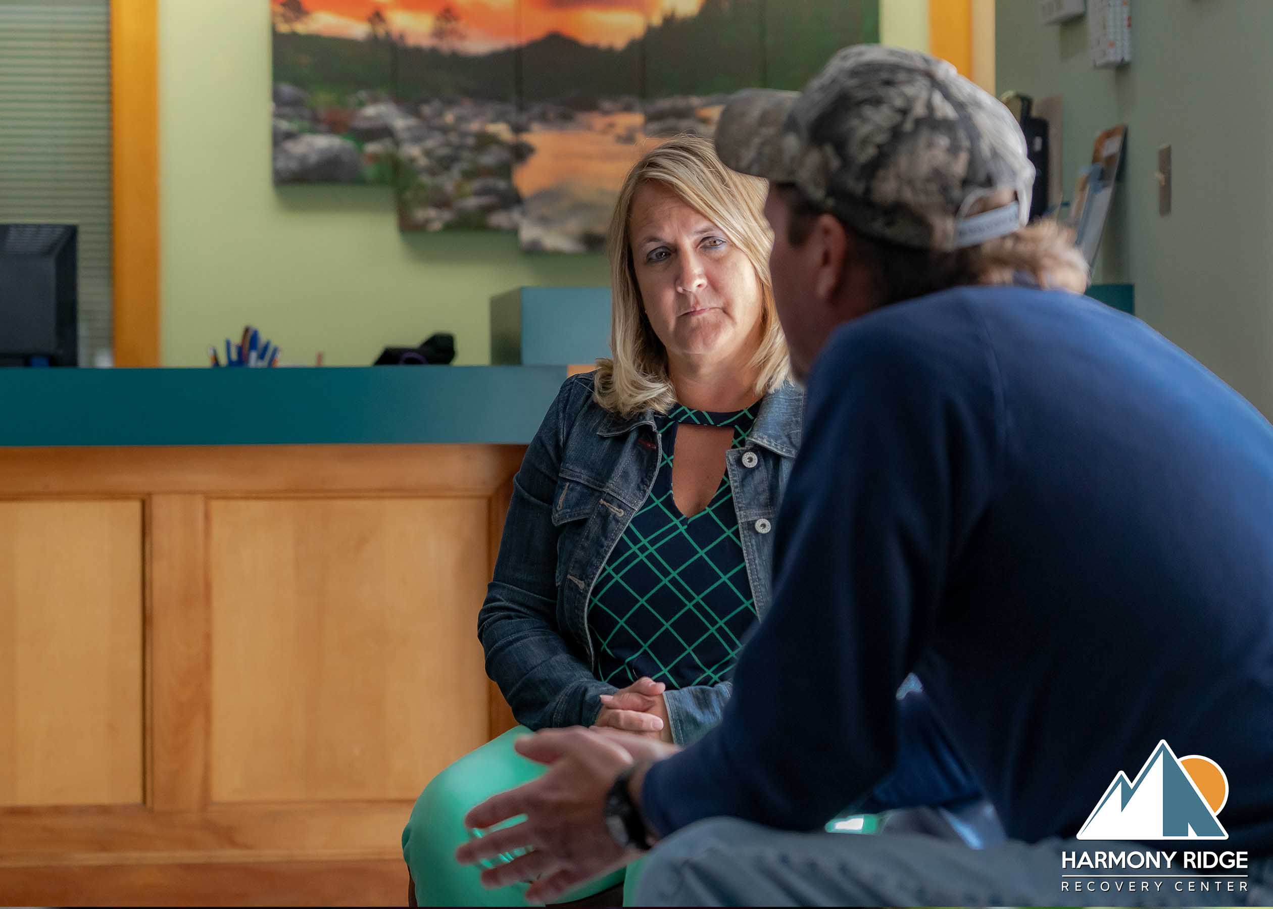 A patient and therapist talking during the residential treatment at Harmony Ridge Recovery Center