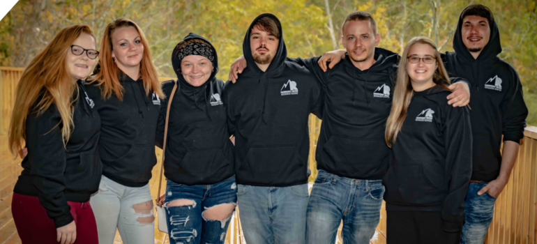 A group of young people at a rehab center for young adults.