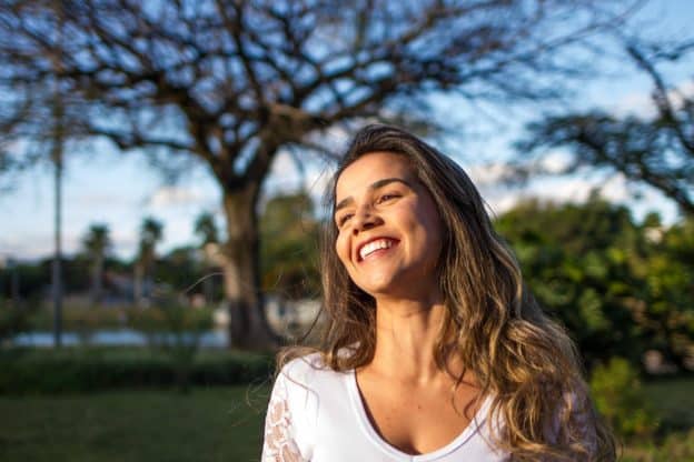 woman smiling outdoors