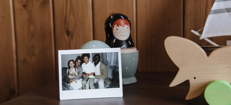Family photo on a bedside table.