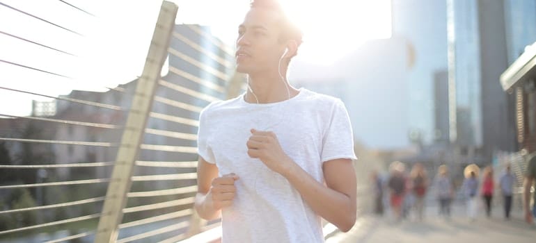 Young man jogging as a part of his heart-healthy lifestyle during your recovery in WV