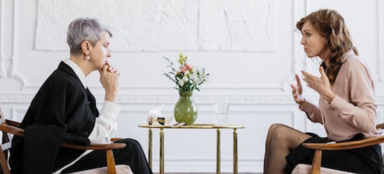 A woman and her therapist during a therapy session.