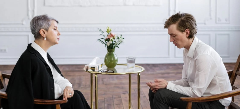 A psychotherapist and a client during a CBT session.