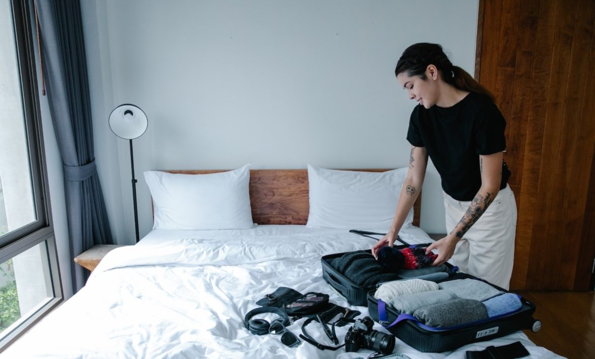 Woman packing for rehab Morgantown WV center.