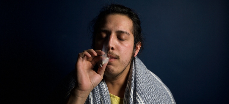 person smoking a joint