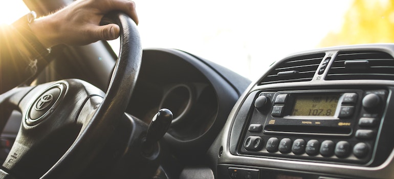 A person driving a car.