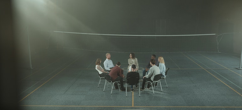 A group of people in a group therapy session.