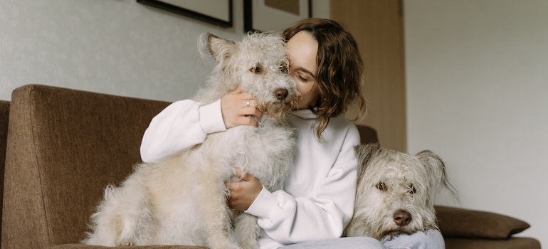 A woman with two dogs.
