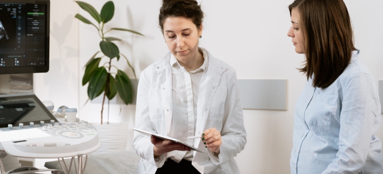 pregnant woman and her doctor