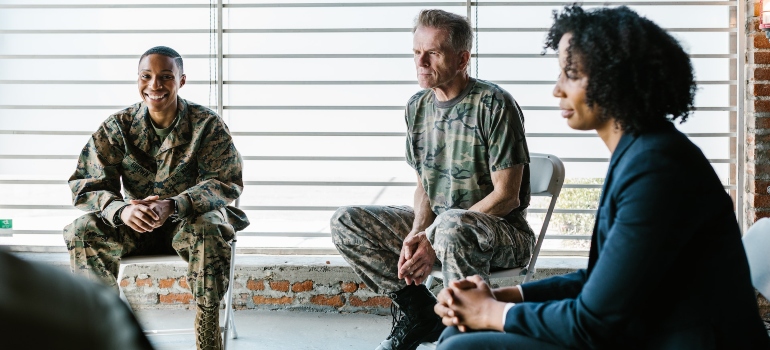 therapist explaining rehab for veterans