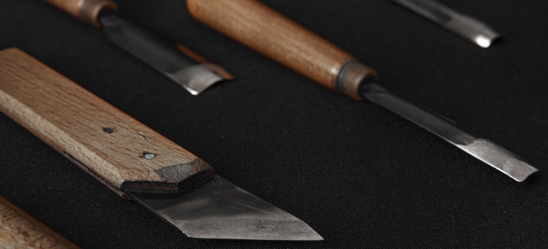 knives on a black cloth