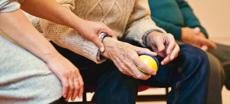 Elderly person in group therapy.