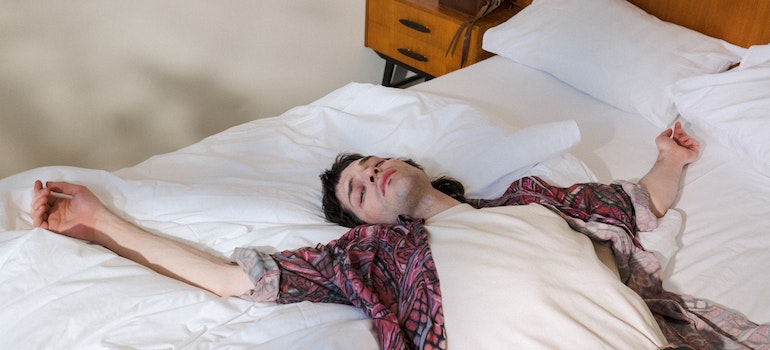 Man lying on a bed.