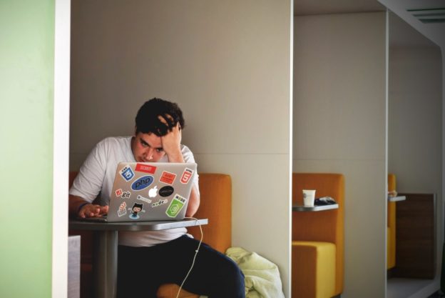 person considering how to keep your job before, during, and after addiction treatment in WV