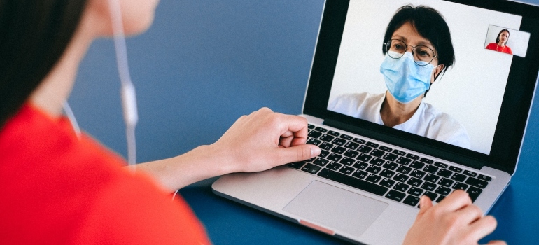 consulting with a doctor online, representing Finding Acceptance on Your Recovery Journey