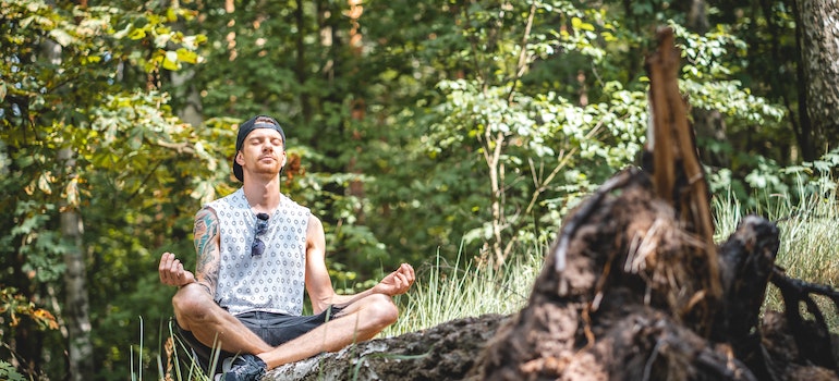Man meditating in nature.