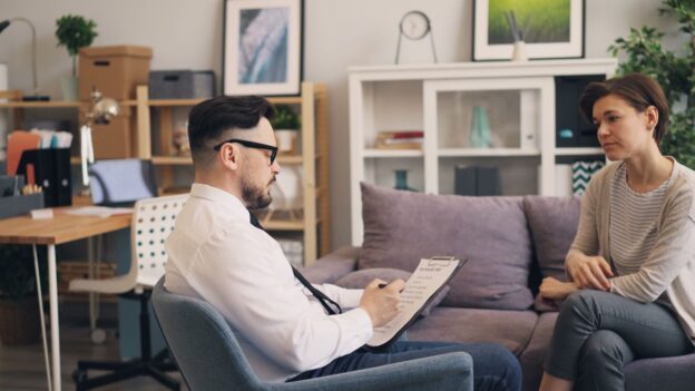 Woman talking about how to prepare for cocaine detox with her therapist.