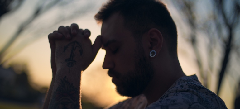 a calm and focused man representing tips for traveling while in recovery