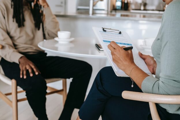 therapist explaining common obstacles to making positive changes in life