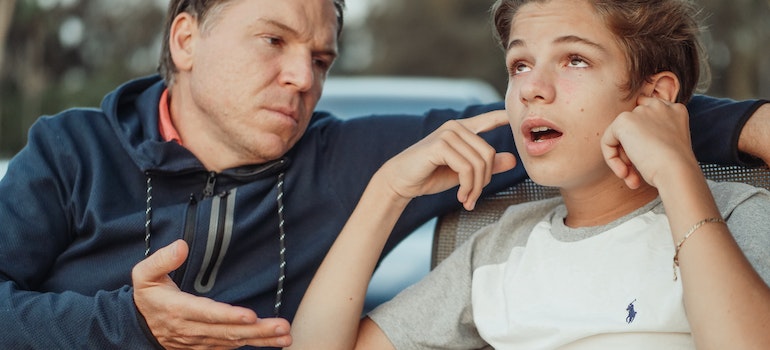 A father trying to talk to his son