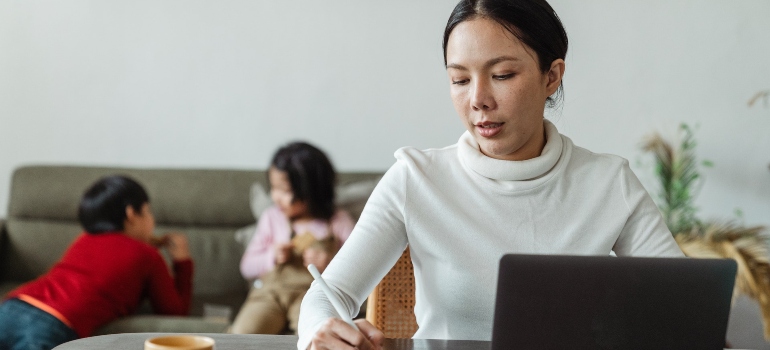 busy mom exploring burnout as an underlying cause of addiction