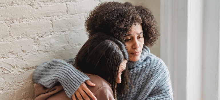 kind friend explaining how toxic relationships influence addiction