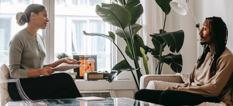 professional explaining how to financially recover after addiction