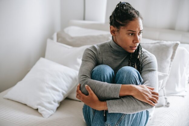 worried young woman thinking whether to give rehab in Clarksburg another chance