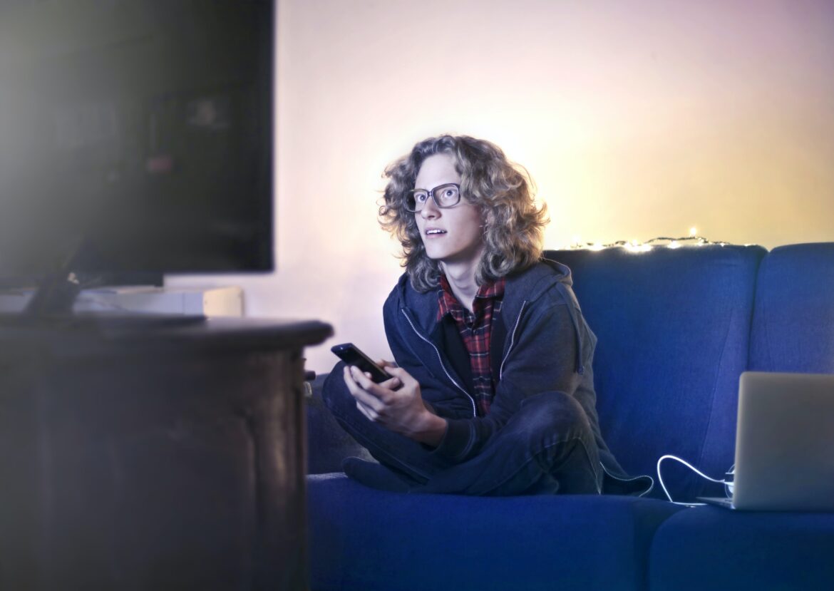Young man listening about the ways media and television influence drug use