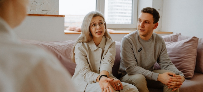 a woman talking to a healthcare professional