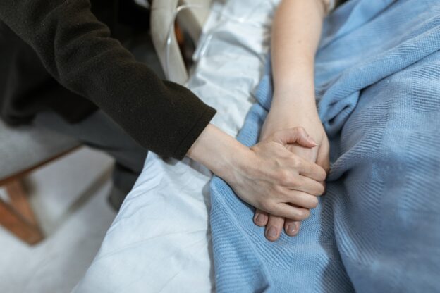 a person supporting a loved one in recovery