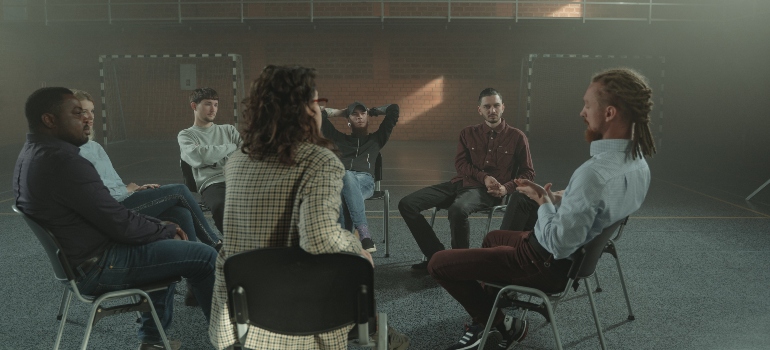 people attending a group therapy session