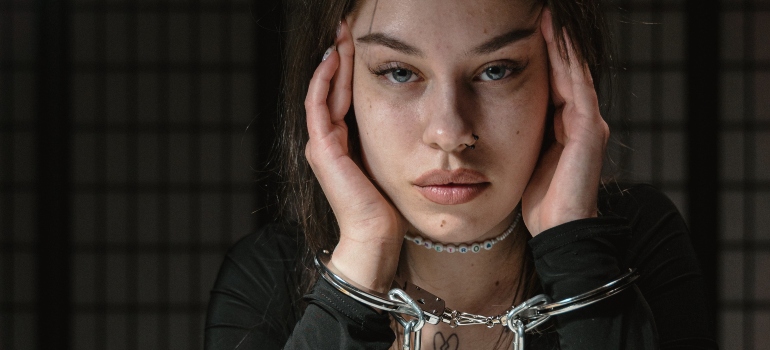 person wearing handcuffs