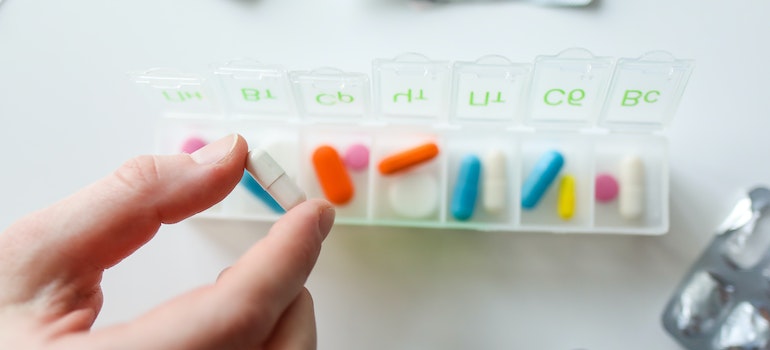 prescription drugs in a weekly dispenser