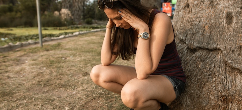 An anxious student thinking about commonly abused drugs in colleges in West Virginia