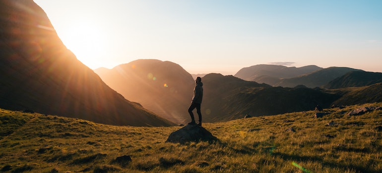 A man watching sunrise