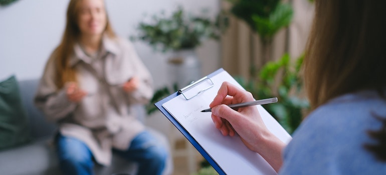 A therapist taking notes
