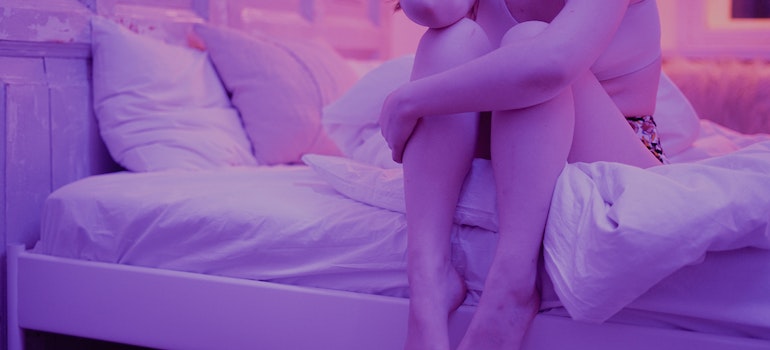 Woman not being able to sleep because of night sweats and alcohol use.