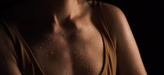 Woman suffering from night sweats and alcohol use.