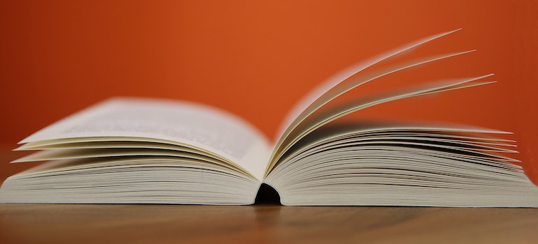 an open book against red background