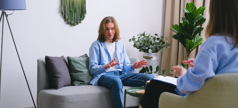 A person talking during treatment as part of a program designed to address the impact of drug addiction on the criminal justice system in WV