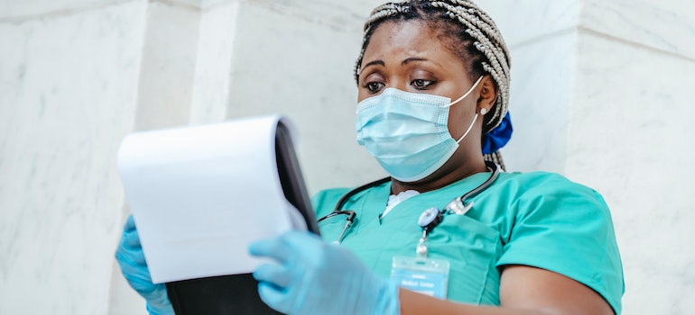 a physician reading about the five pillars of recovery from trauma and addiction