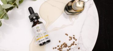 cbd oil spilled on the table after using cbd in addiction recovery
