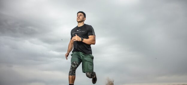 a male running representing benefits of exercise for recovery and sobriety
