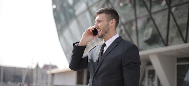 Man talking on the phone to emphasize a professional battling addiction in small-town West Virvinia