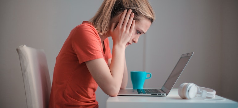 a woman reading denied rehab insurance claim in WV
