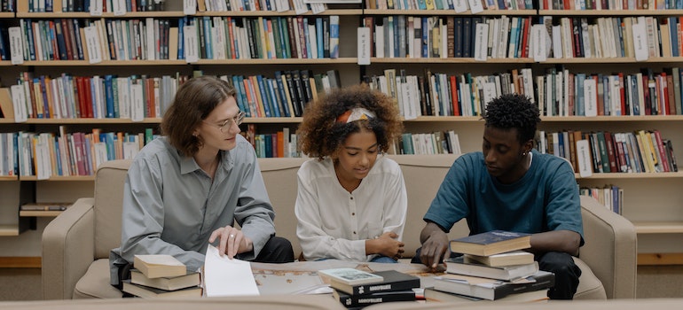 Students studying together in a library